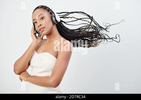Woman listening to music Stock Photo