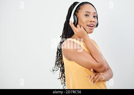 Woman in headphones ing Stock Photo