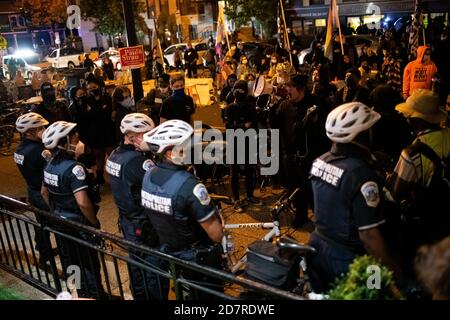 Washington, USA. 24th Oct, 2020. Demonstrators rally in the Adams Morgan neighborhood during a protest organized by the They/Them Collective in the memory of Dominique Mulkey, who was killed by police in Tampa, FL, earlier this week, in Washington, DC, on October 24, 2020 amid the coronavirus pandemic. Nearly 22 weeks after the police killing of George Floyd, near-daily protests demanding police reform and an end to systemic racism continued in Washington days after Mayor Muriel Bowser formally requested an increase in police funding.(Graeme Sloan/Sipa USA) Credit: Sipa USA/Alamy Live News Stock Photo