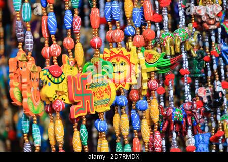 Chains for wearing on the neck made of colorful beads and various designs hanging Stock Photo