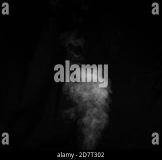 Figured smoke on a dark background. Abstract background, design element, for overlay on pictures Stock Photo