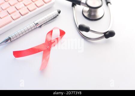 Black ribbon and stethoscope on white background. Melanoma concept ...
