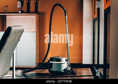 Janitorial service. Professional vacum cleaner. Stock Photo