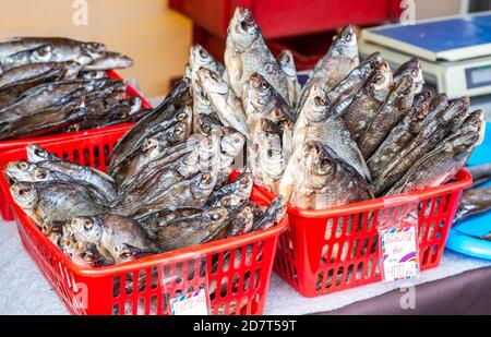 Tasty different dried salt fish ready to sale at the farmers market Stock Photo