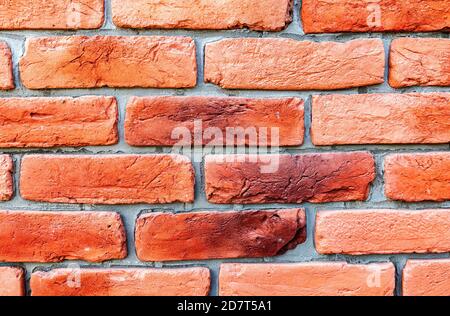 Red brick wall texture as creative background. Bricks masonry with seams Stock Photo