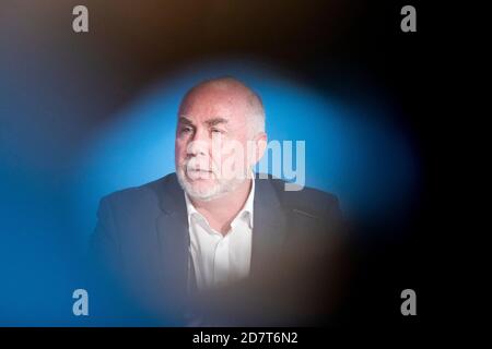 Potsdam, Germany. 25th Oct, 2020. Ulrich Silberbach, chairman of the civil servants' association dbb, speaks at a press conference to announce the agreement in the collective bargaining for the public service of the federal government and the municipalities. Credit: Christoph Soeder/dpa/Alamy Live News Stock Photo