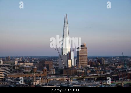 The Shard and Guy's Hospital at sunset as seen from the Golden Gallery of St. Paul's Cathedral, London. Stock Photo
