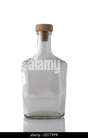Empty transparent, glass bottle with a brandy with cork isolated on white background. Stock Photo