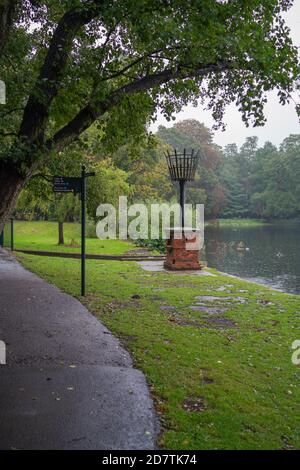 St Helens Church . Boultham Park Lincoln, Boultham Park, Lincoln, Lincolnshire, seating, shelter, area, park bench. Stock Photo