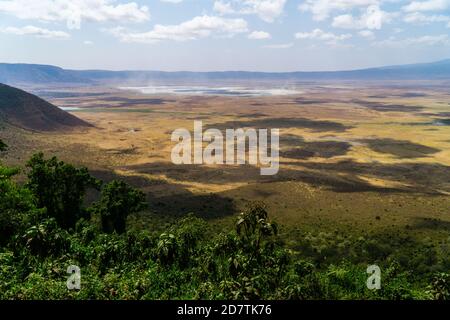 Ngorongoro Conservation Area, is a protected area and a World Heritage Site located 180 km (110 mi) west of Arusha in the Crater Highlands area of Tan Stock Photo