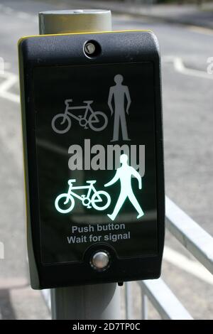 Alloway, Ayrshire, Scotland, UK Pelican Crossing showing cycles and pedestarian sign green , saying cross Stock Photo