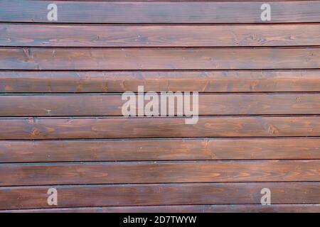 Wood texture background. The building is built of wooden boards. Stock Photo