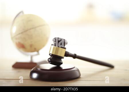 Gavel with globe.Law concept Stock Photo