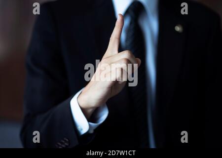 Lawyer showing number one finger Stock Photo