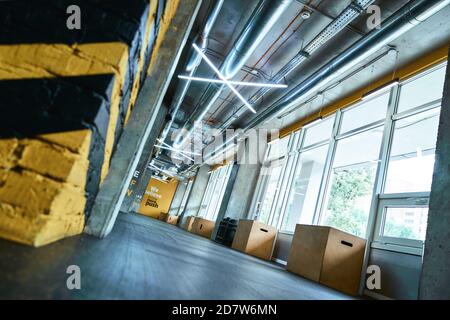 Modern empty crossfit gym or fitness studio. Sport concept, health club ...