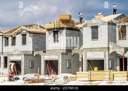 Miami Florida,Kendall townhouses under new construction site building,cinder block homes, Stock Photo