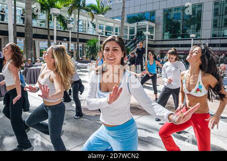 Miami Florida,Mayor's Health & Fitness Challenge,filling fills completing completes answers answering survey,Hispanic woman female man male, Stock Photo