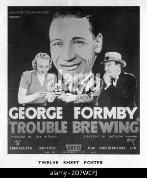 GEORGE FORMBY GOOGIE WITHERS and GUS McNAUGHTON in TROUBLE BREWING 1939 director ANTHONY KIMMINS made at Ealing Studios Associated Talking Pictures (ATP) / Associated British Film Distributors (A.B.F.D.) Stock Photo