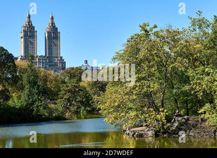 New York, NY - October 14, 2020: The double spires of the San Remo residential building are seen from Central Park, looking across the Lake. The San R Stock Photo