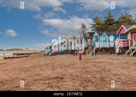 wells next the sea beach huts on the North Norfolk coast of England. Stock Photo