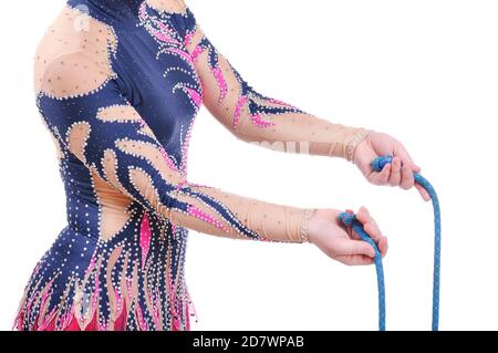 Close up of artistic female gymnast showing how to hold a rope Stock Photo