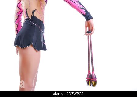 Close up of artistic female gymnast showing how to hold a gymnastic mace Stock Photo