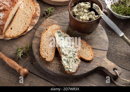 A slice of bread with nettle butter - homemade spread made of wild ...