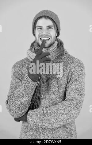 guy feel warm and comfortable. male knitwear fashion. men knitted cloth and accessory. male blue background. poor homeless man. funny man feeling cold in winter. no flu. winter weather forecast. Stock Photo