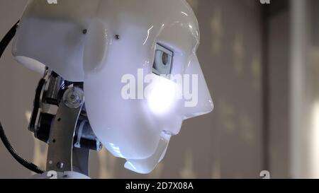 Talking humanoid android robot head. Stock Photo