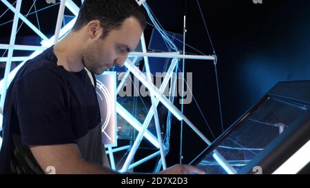 The man using huge touchscreen display. Stock Photo