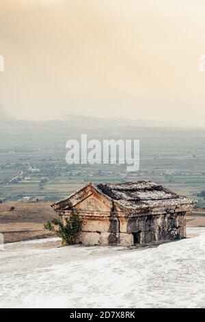 Hierapolis ancient city Pamukkale Turkey, young woman with hat watching ...