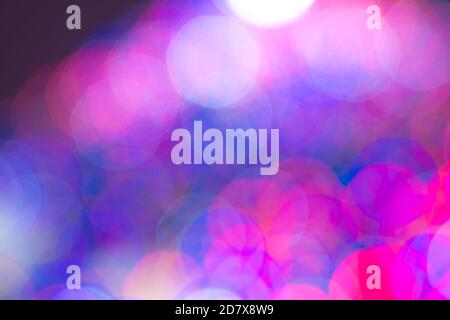 bright colored blurry round spots of cool shades for a vivid purple background Stock Photo