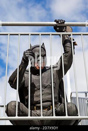 Umea, Norrland Sweden - September 5, 2020: Batman squats at the ledge Stock Photo