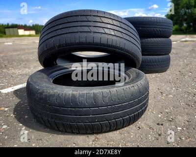 A pile of old car tires lie Stock Photo