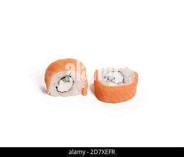 Philadelphia roll sushi with salmon cream cheese on a white isolated background. Sushi menu. Stock Photo