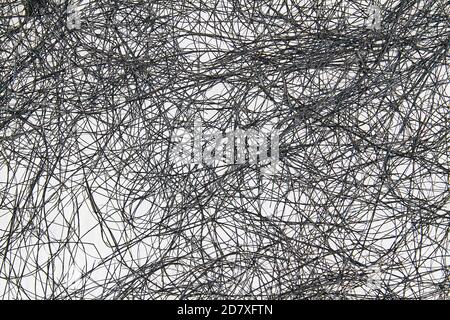 Abstract background from twisted thin branches or blades of grass Stock Photo
