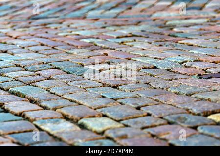 stone pavement texture, granite cobblestoned pavement background, abstract background of old cobblestone pavement close-up Stock Photo