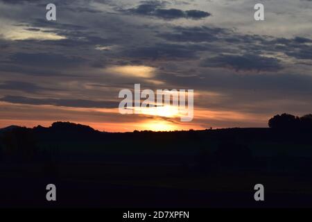 fire-like sunrise in the Eifel Stock Photo