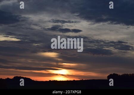 fire-like sunrise in the Eifel Stock Photo
