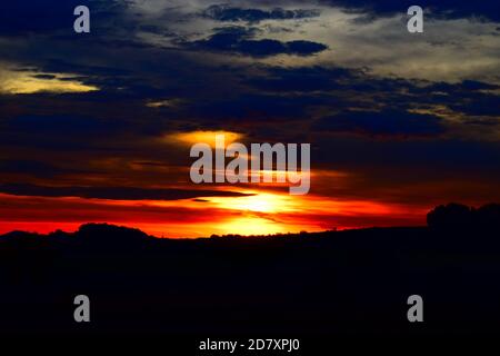 fire-like sunrise in the Eifel Stock Photo