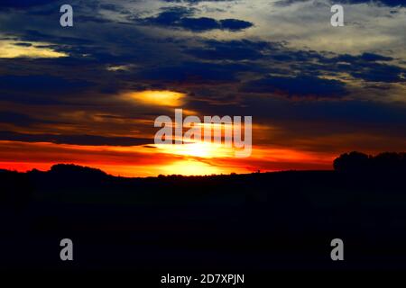 fire-like sunrise in the Eifel Stock Photo