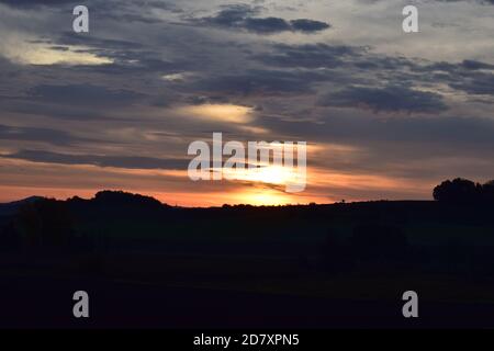 fire-like sunrise in the Eifel Stock Photo