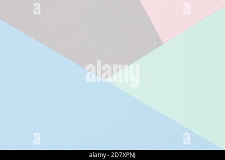 Abstract colored paper texture background. Minimal geometric shapes and lines in blue, light green, pastel pink, gray colours Stock Photo