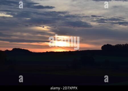 fire-like sunrise in the Eifel Stock Photo