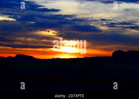 fire-like sunrise in the Eifel Stock Photo