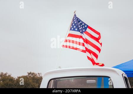 American flag on back of patriotic pickup truck Stock Photo