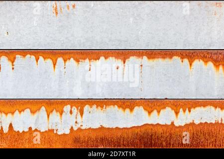 3 Panels of a garage door with interesting rust patterns Stock Photo