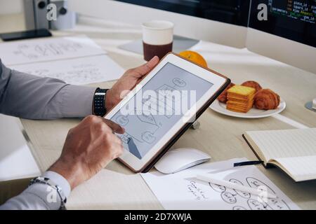 Programmer drawing block diagram Stock Photo