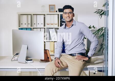 Positive confident Indian businessman Stock Photo