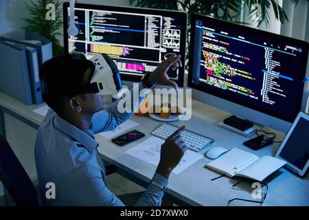 Programmer testing VR app Stock Photo